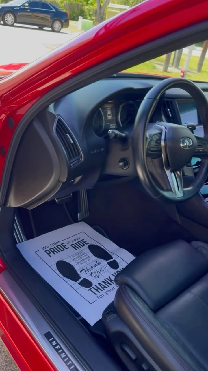 Red Infiniti leather interior after cleaning